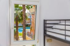 Apartamento en Javea / Xàbia - La Romana Triplex Apartment Javea Arenal, con Terraza, AC, Piscina , Jardín, Tennis,
