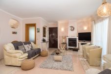 Casa Prazeres open-plan living room with sofas.