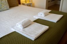 Апартаменты на Lisboa - Apartamento confortável com vista rio, totalmente equipado, muito perto do centro de Lisboa no tradicional bairro de Alfama.